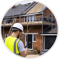 Sandown - roofer with scaffolding checking repairs