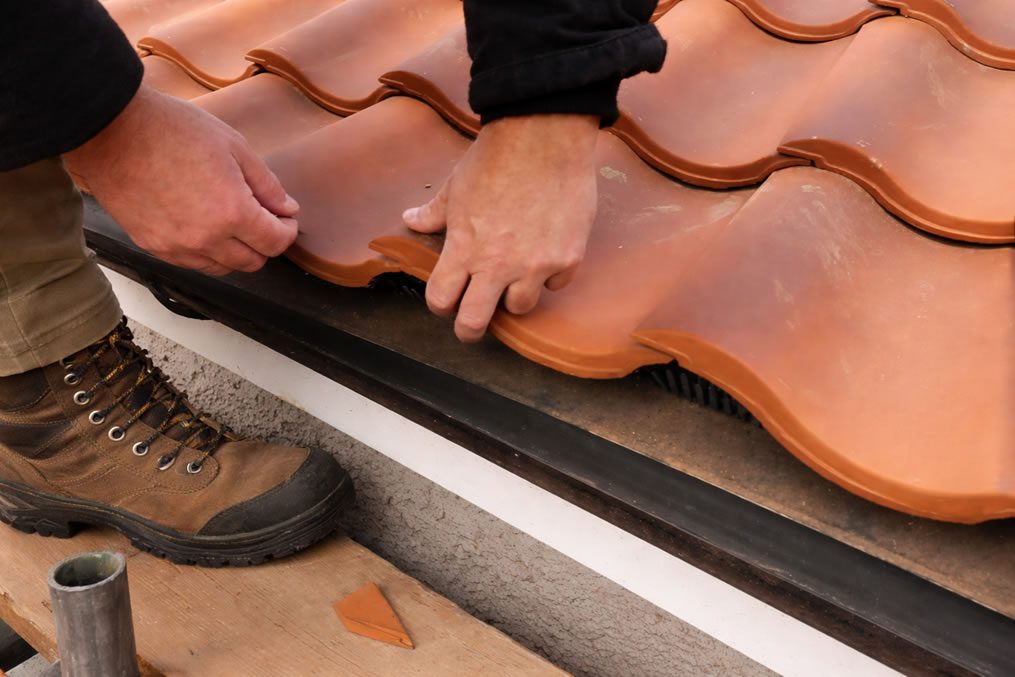 broken tile roof repairs uk