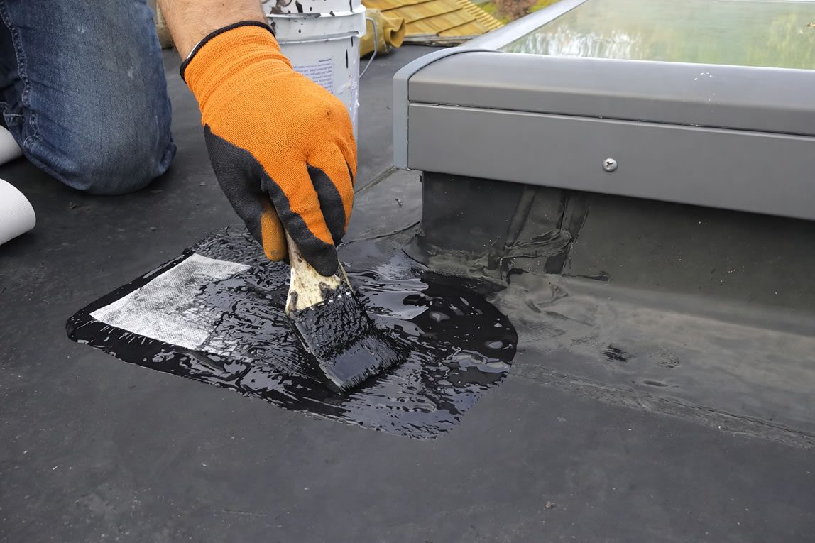 epdm rubber roof sealant application with patch