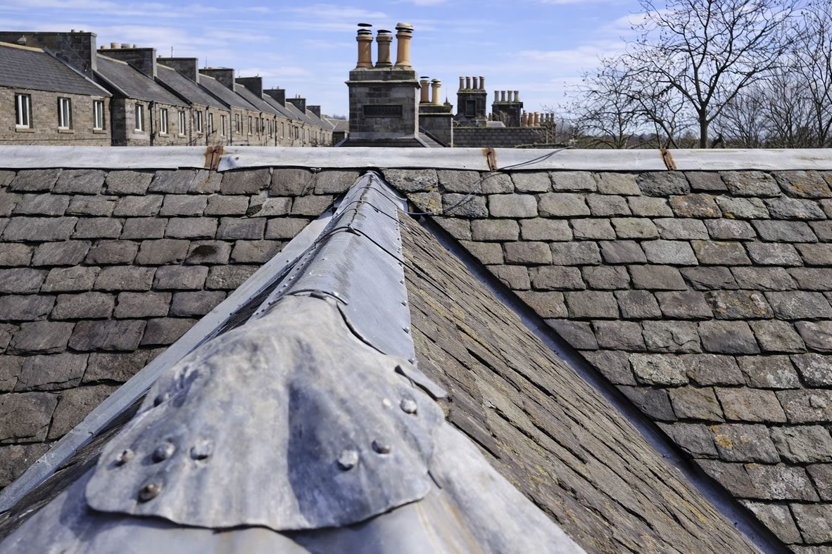 roof leak repairs lead-work on old slate tiled roof