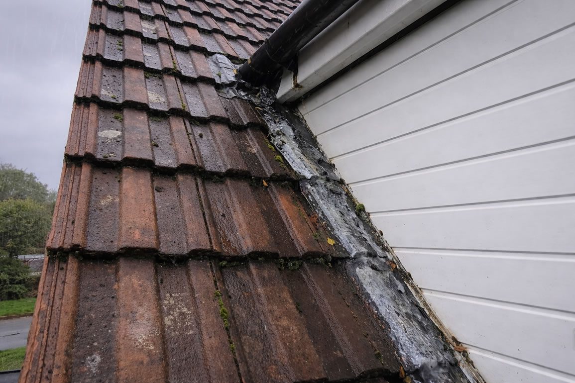tile roof storm damage flashing repairs