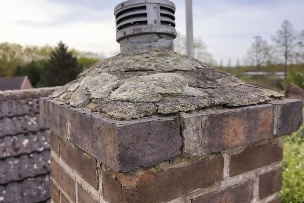 weathered chimney cap repairs